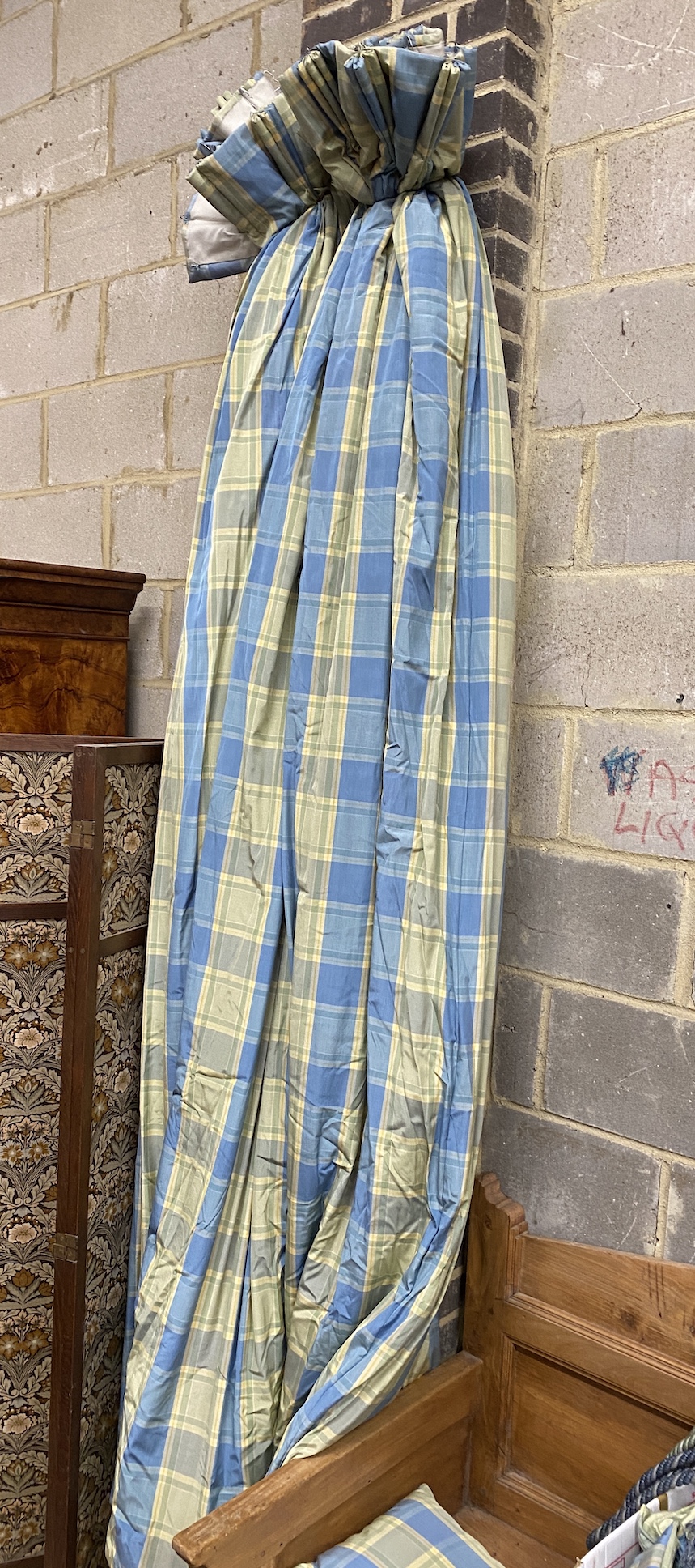 A pair of blue / green check lined curtains approximate widths 140cm top, 320cm floor, drop 250cm with five matching drapes, three cushions and four tie backs